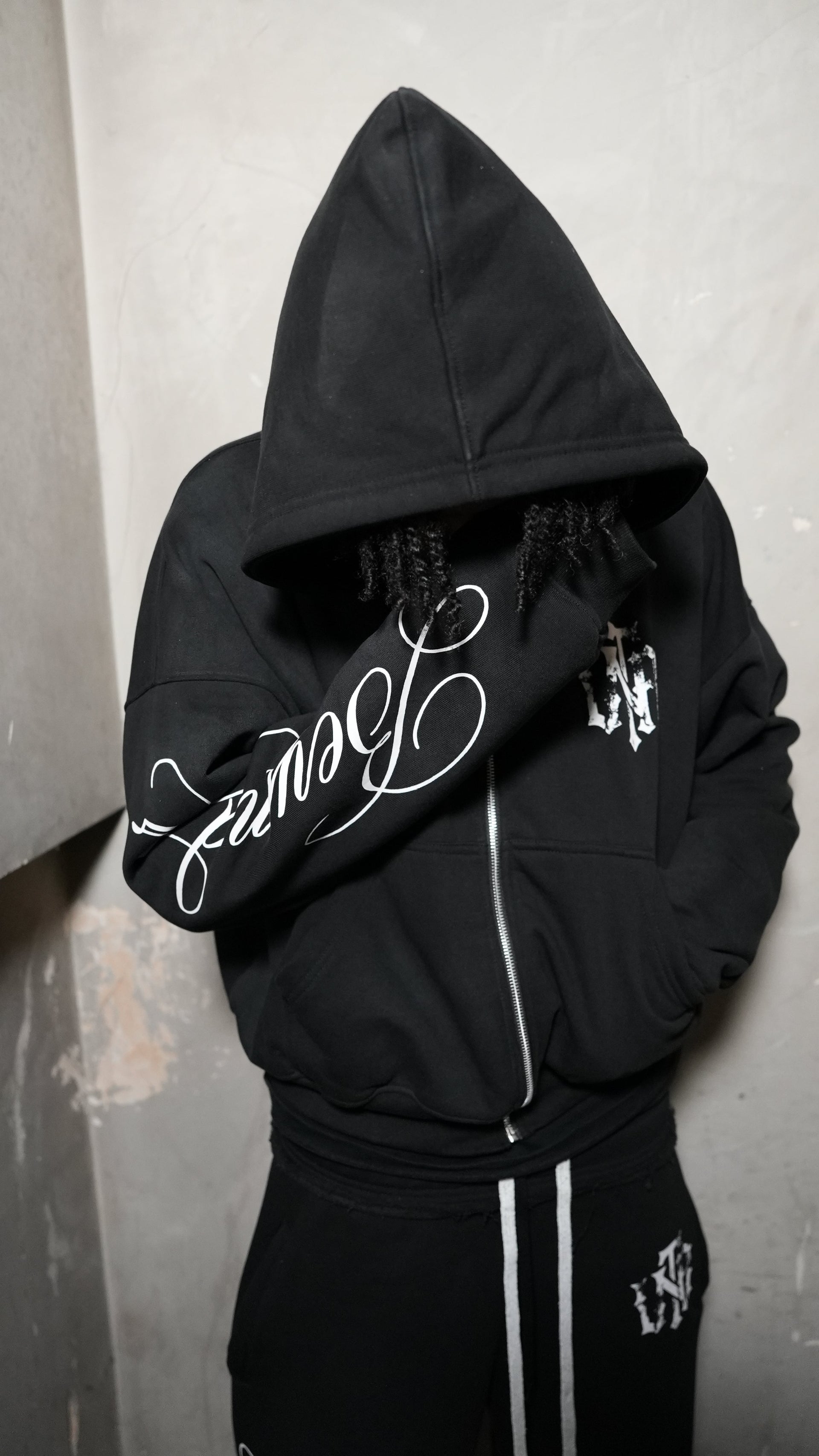 beyond fear zip-up black